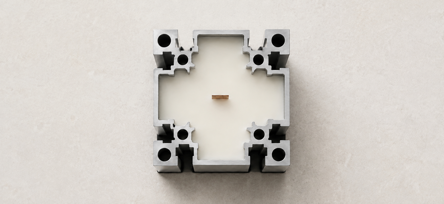 Top view of A-04 Candle Vessel showing the thin aluminum profile, soy wax, and wood wick